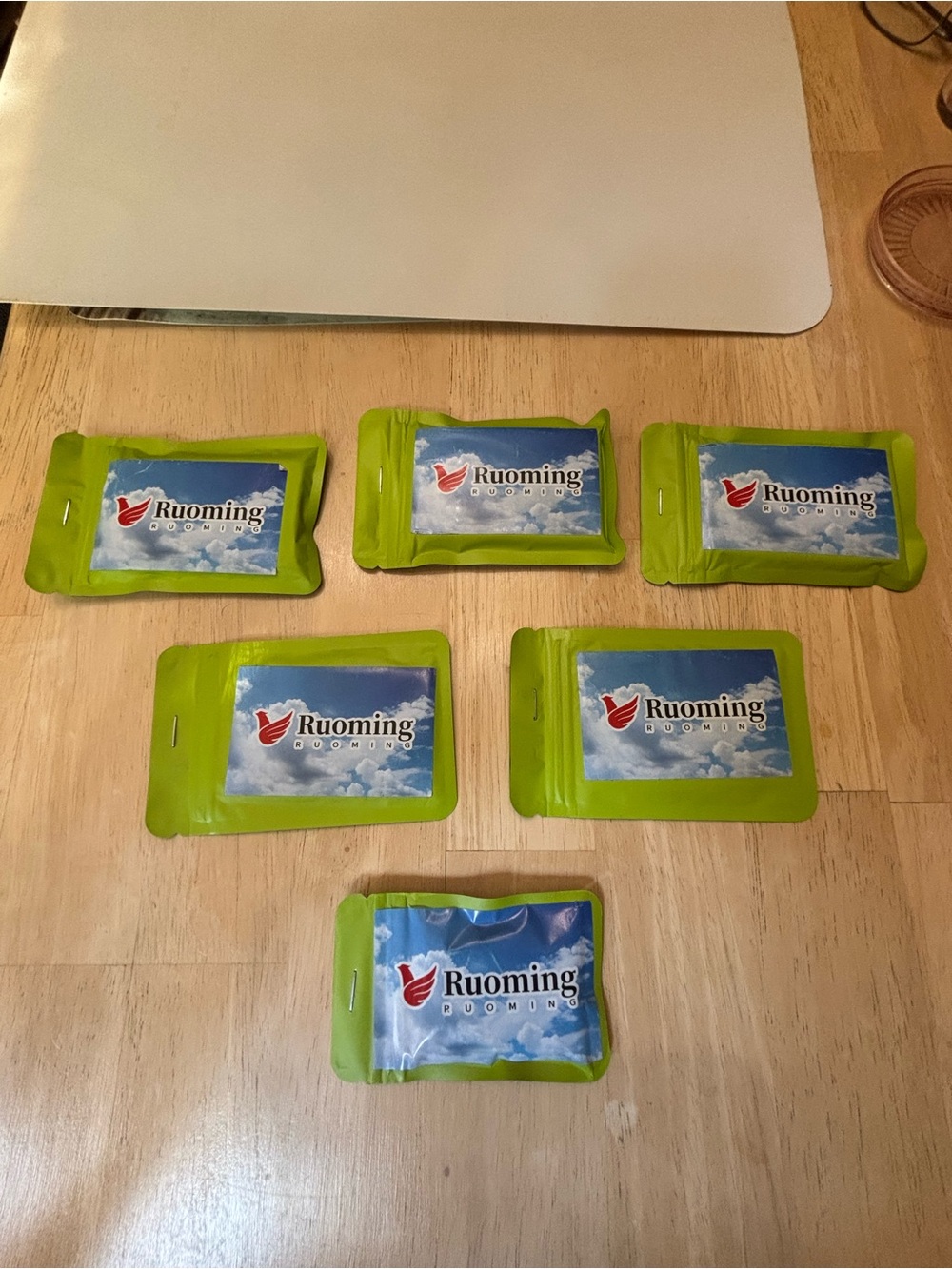 Ruoming green sealed and stapled packs.